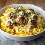 lls served over creamy Parmesan linguine Recipe