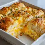 Press the dough evenly into the prepared baking dish as a biscuit base Recipe