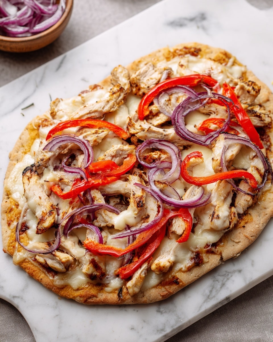 The image shows a flatbread pizza on a white marble surface, with a thin, golden-brown crust as the base layer. On top of the crust is a layer of melted cheese that looks creamy and slightly bubbly. The next layer consists of grilled chicken pieces that are light brown with some char marks. Over the chicken, there are slices of bright red bell peppers and rings of purple-red onions, spread evenly across the pizza. The edges of the crust are slightly raised and crispy, and the toppings show a mix of soft melted cheese and fresh, crunchy vegetables. Photo taken with an iphone --ar 4:5 --v 7