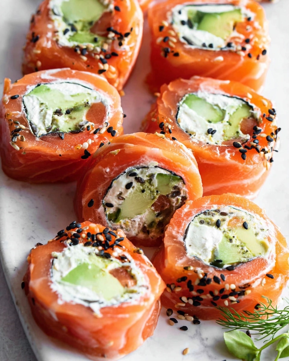 The image shows several pieces of sushi rolls arranged closely on a white plate with a white marbled texture background. Each roll has three main layers: the outer layer is a bright orange with a slightly shiny, smooth texture, topped with black and white sesame seeds scattered unevenly. Inside, there is a creamy white layer that looks soft and thick, filled with green avocado chunks and darker green cucumber pieces, creating a fresh contrast. The sushi pieces are round and cut cleanly, showing a neat swirl of the layers inside. A small green herb sprig is placed near the top right side of the plate as a garnish. photo taken with an iphone --ar 4:5 --v 7