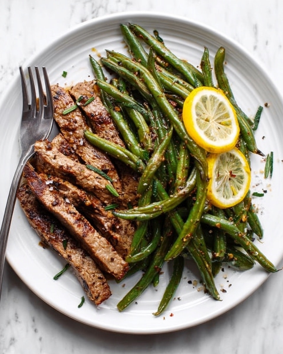 The image shows a white plate on a white marbled surface with cooked green beans on the right side and grilled strips of meat on the left side. The green beans are whole, shiny, and slightly wrinkled with small bits of seasoning, and two thin slices of lemon are placed on top. The grilled meat strips are brown with visible char marks and textured with spices. A fork rests on the plate’s left edge, and a woman's hand slightly touches the fork from the top right corner. Small herbs and seasoning are sprinkled lightly on the plate. Photo taken with an iphone --ar 4:5 --v 7
